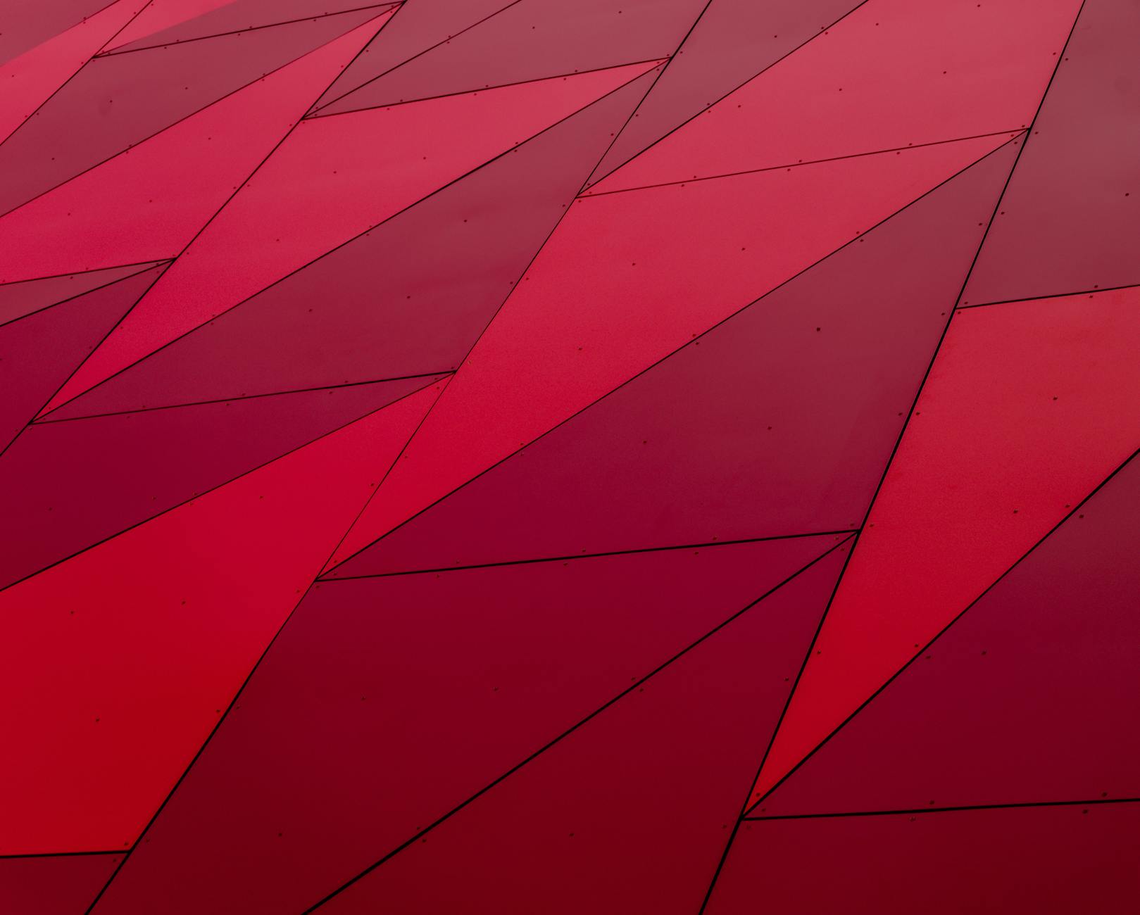 An abstract geometric pattern with red triangles, perfect for modern design needs.
