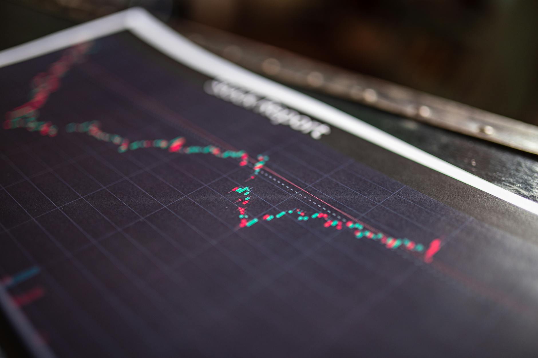 Close-up of a stock report showing a financial data graph.