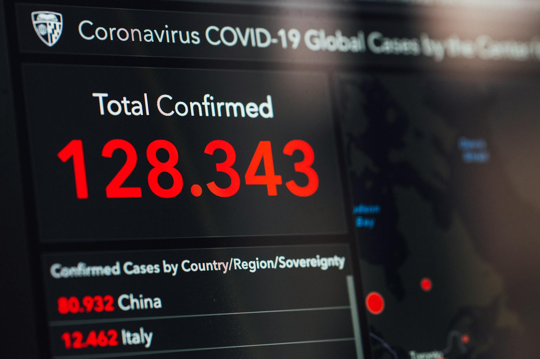 Digital display showing COVID-19 global confirmed cases in real-time.