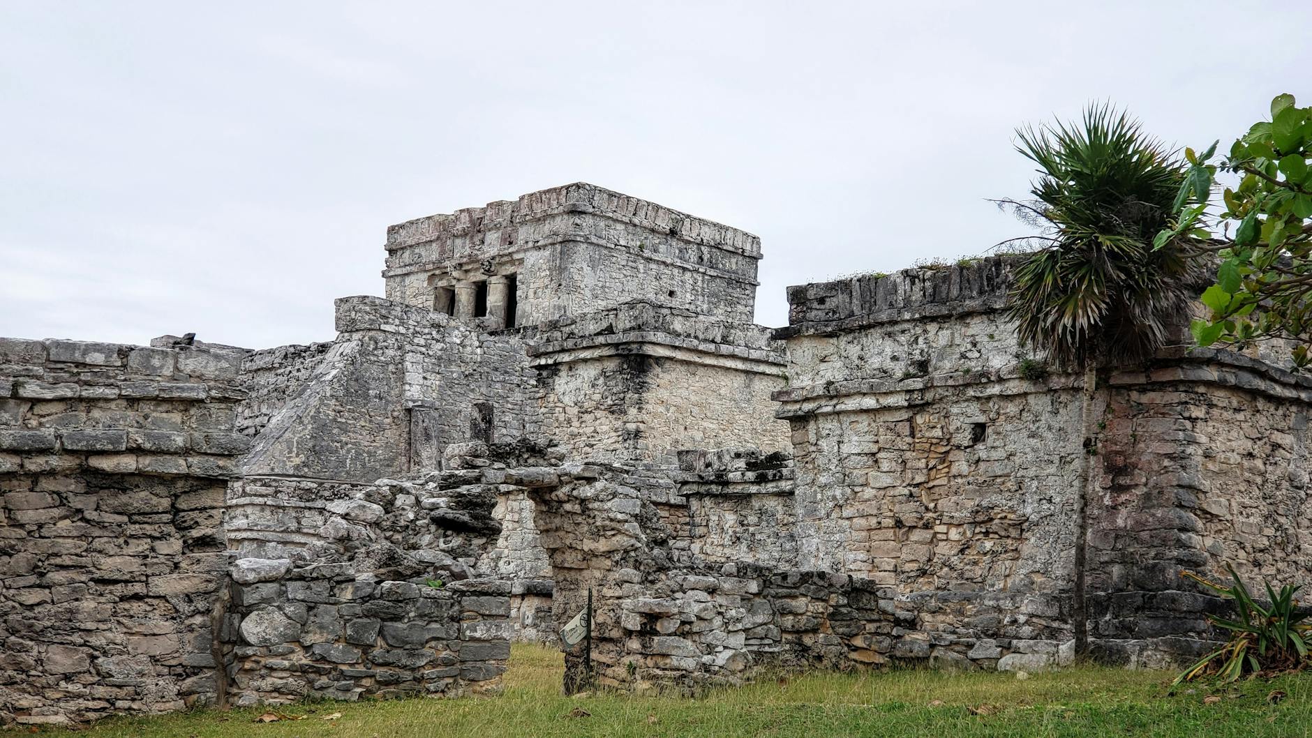 Explore the historic ancient ruins of Tulum, Mexico, showcasing Mayan architecture against a tropical backdrop.
