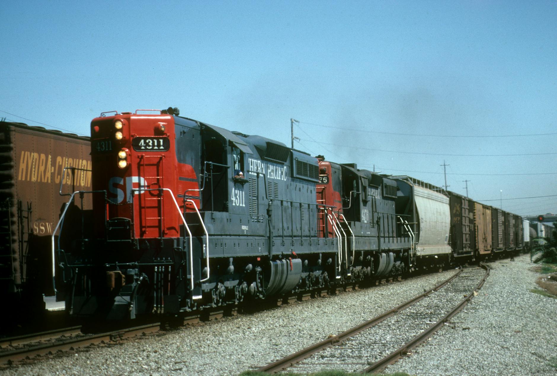Southern Pacific train 4311 moving on tracks in Santa Clara, California.